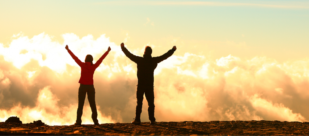 Couple on top of mountain