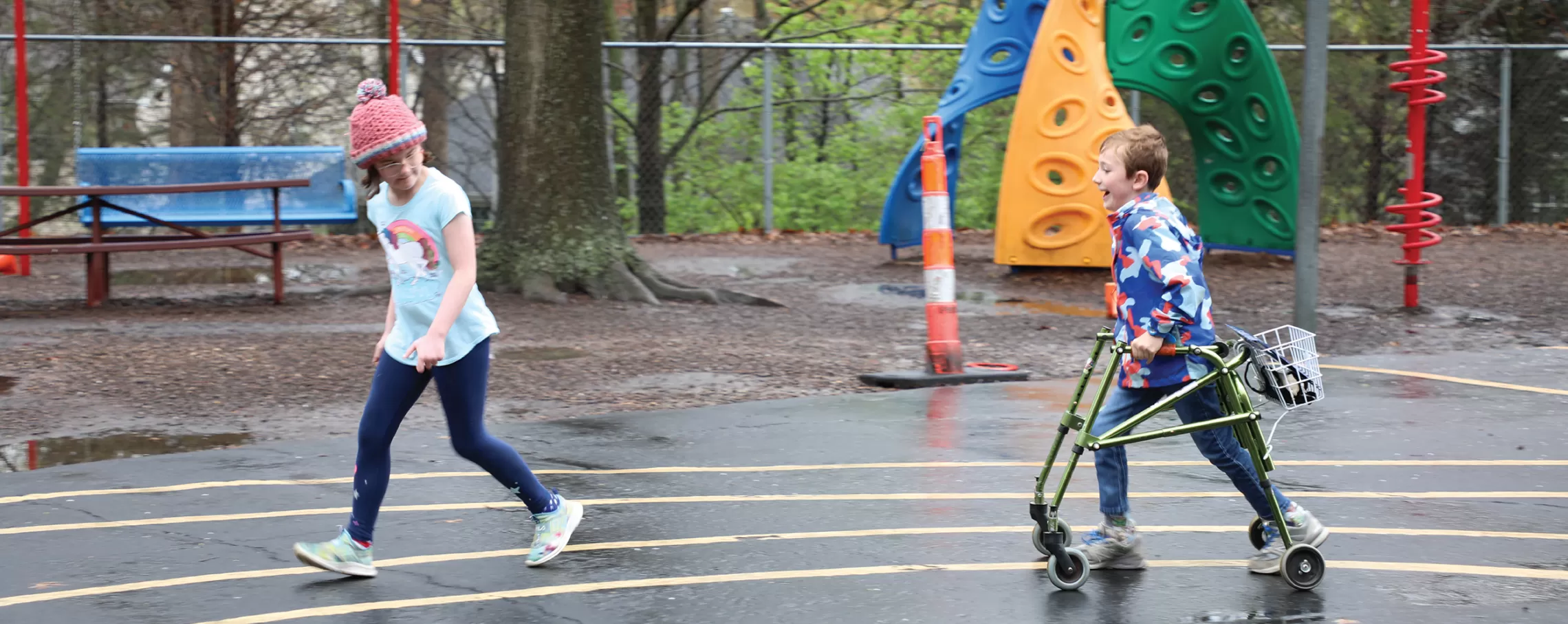 Two girls on the track of the playground